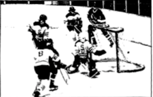 "Is it in or out?" David Hadlow (#30, Goalie) and Ed Shaw (#8, Defense)